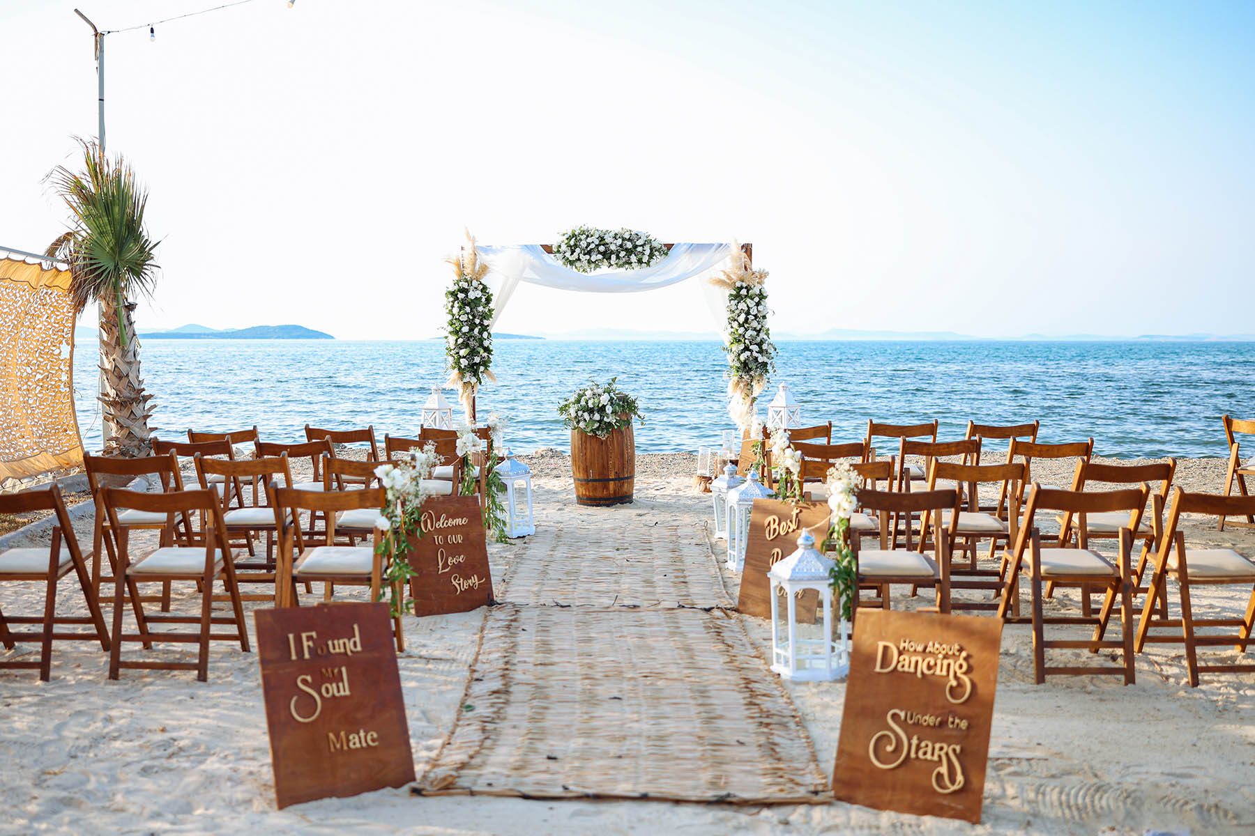 Romantic wedding ceremony. Beautiful setting for outdoors wedding ceremony waiting for bride and groom and guests. Decoration